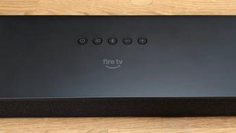 Amazon Fire TV Soundbar Plus Dolby Atmos soundbar detail of control buttons on top of unit