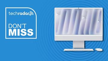 Apple iMac M4 stationær computer med Apple tastatur og mus på en blå TechRadar tilbudsbaggrund