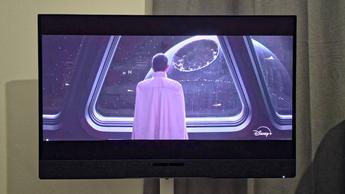 The Dell S3225QC monitor displaying a clip from Star Wars Andor