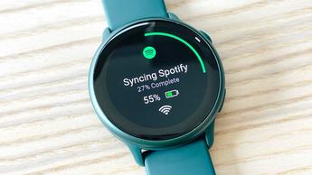 Garmin Vivoactive 6 close-up showing Spotify on the watch