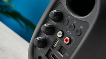 the majority d80 speakers, a pair of black egg-shaped speakers with mesh casing, HDMI, bluetooth, aux connectivity