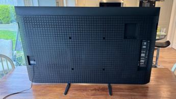 Sony Bravia 7 55-inch 4K TV on wooden dining table showing rear of set