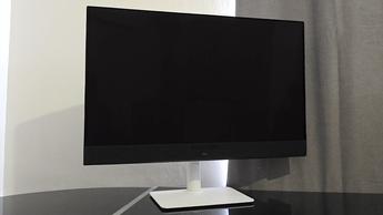 The Dell S3225QC monitor at an angle on a desk