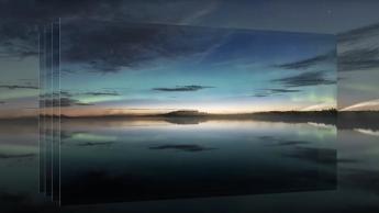 Четыре OLED-панели, отображающие яркий закат