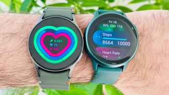 Close-up of the Samsung Galaxy Watch 7 on a user's wrist next to the Garmin Vivoactive 6