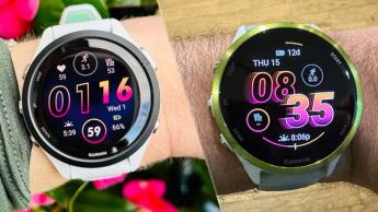 Nahaufnahme der Garmin Forerunner 265 und Garmin Forerunner 570 Smartwatches nebeneinander