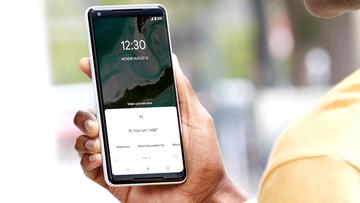 Google Assistant-logotyp på vit bakgrund