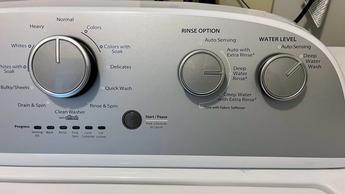 Whirlpool WTW4957PW 3.8 Cu. Ft. High Efficiency Top Load Washer being tested in writer's home