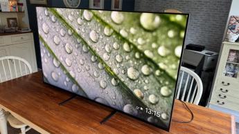 Sony Bravia 7 55-inch 4K TV on wooden dining table with water droplets detail shown on screen