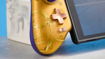 En gylden GameSir G8 Plus mobil gaming-controller