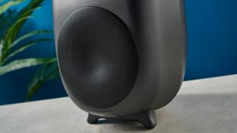 the majority d80 speakers, a pair of black egg-shaped speakers with mesh casing, HDMI, bluetooth, aux connectivity
