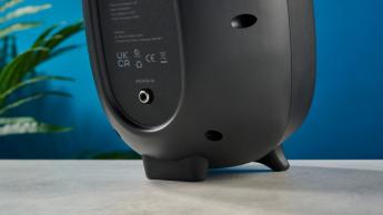 the majority d80 speakers, a pair of black egg-shaped speakers with mesh casing, HDMI, bluetooth, aux connectivity