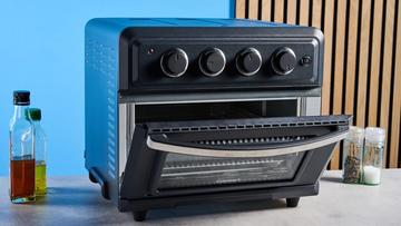 Freidora de aire y horno tostador Cuisinart TOA-60 con elegante acabado negro y cuatro mandos