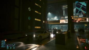 Skærmbillede af Cyberpunk 2077-spil, der kører på en Mac Studio-computer