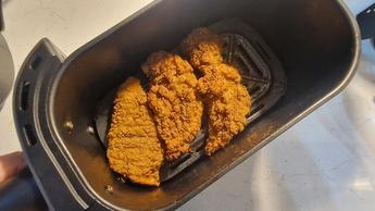 Fritadeira elétrica Philips série 3000 com dois cestos e dois compartimentos de cozimento