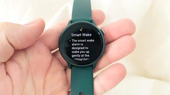 Close-up of the Garmin Vivoactive 6 showing the Smart Alarm feature on the screen