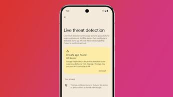 An Android phone on a pink and red background showing Android 16