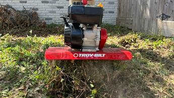 The Troy-Bilt Colt Tiller has a powerful, useful design