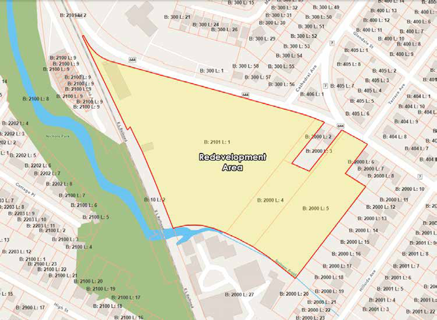 Parcel map of the redevelopment area, outlined in red, showing the block and lot numbers it covers and the surrounding street grid.