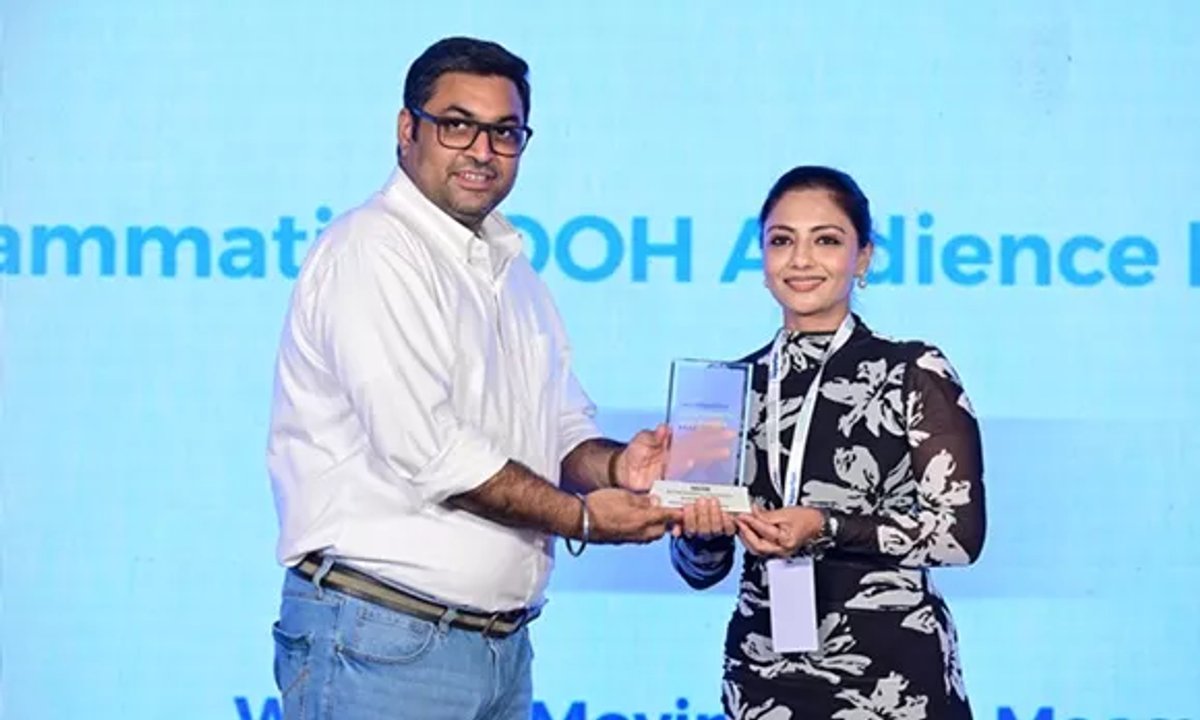 Farha Khan Receiving Silver Award from Programmaic Asia for Moving Walls