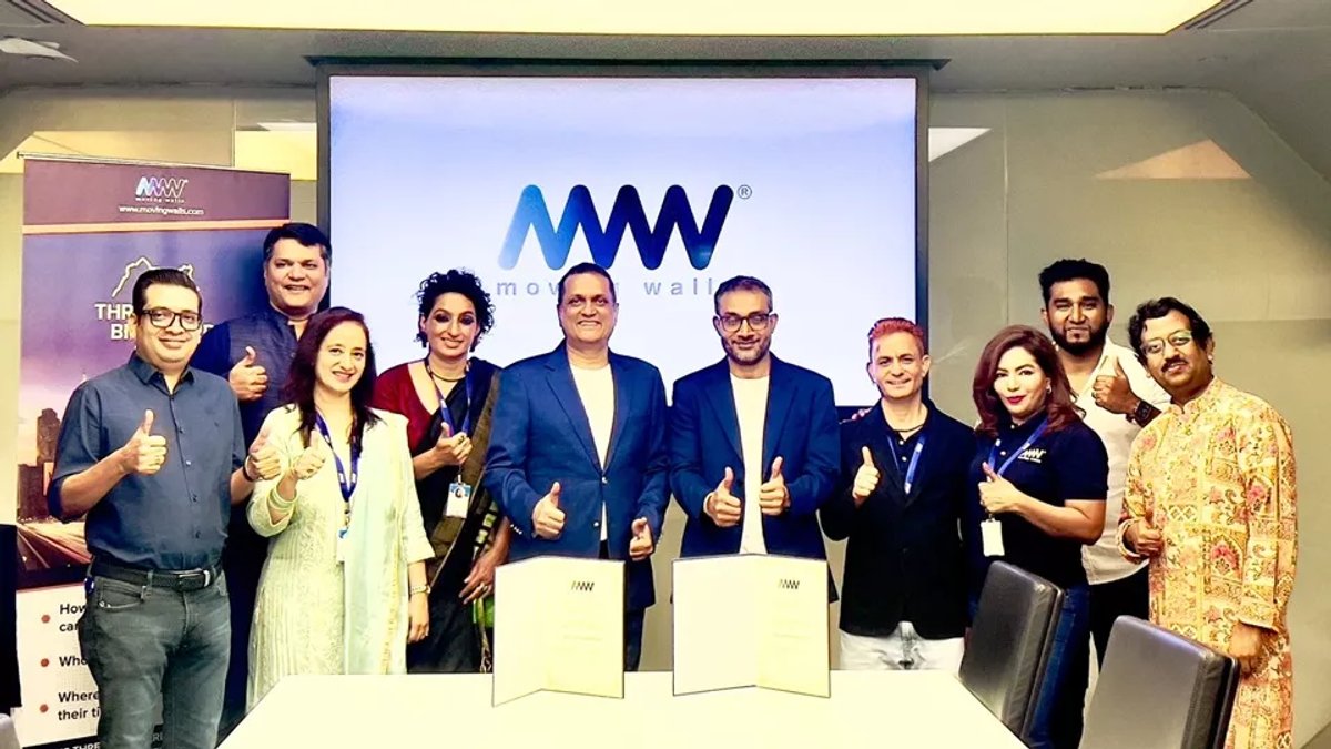 moving-walls-team-with-insightz-club-founder