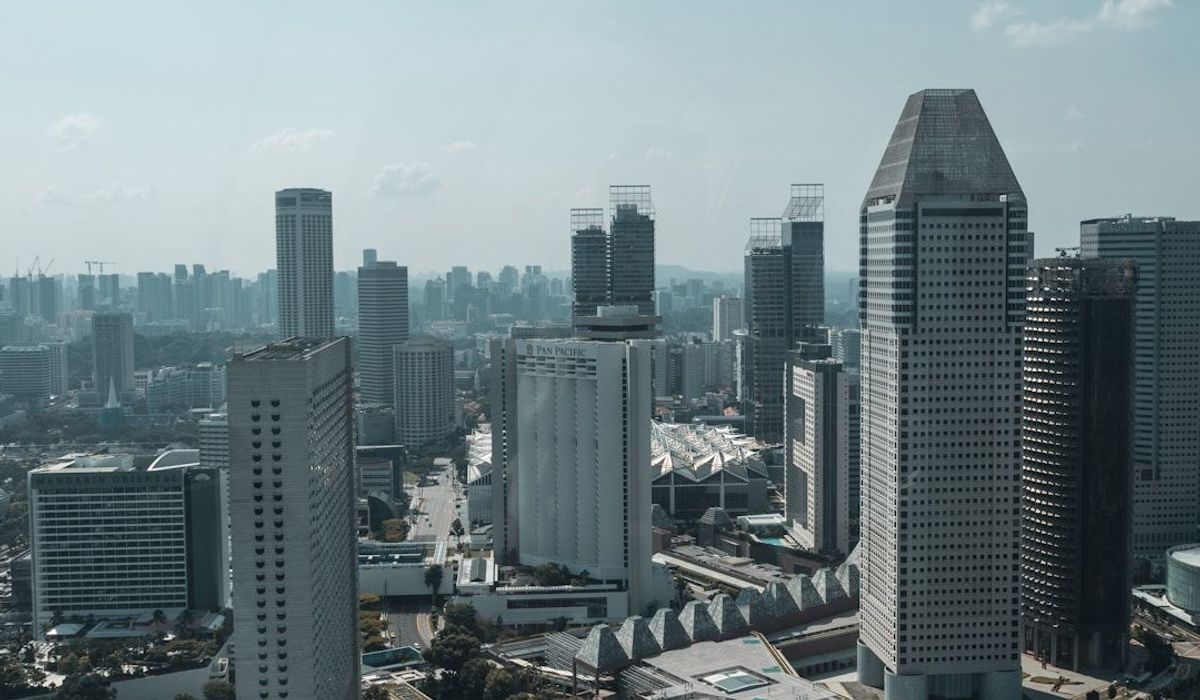 Aerial view of Singapore modern skyline with high-rise towers amid dense urban development