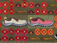 Embroidered quilt with cinnabar caterpillars and moths, striped shield bugs, opium poppy flowers and work shoes (2022), Daniel Dewar & Grégory Gicquel, Jan Kaps, Cologne