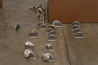 In Medias Res, 2019
26 aluminum Koenig spheres, 4 bronze Koenig spheres (on wall), 37 miniature aluminum bench ends, 1 miniature aluminum bench, 2 miniature long aluminum benches, bars of soap, 2 aluminum dog toys, 1 garden swan, 1 bronze swan, 1 plaster swan mold (near video), 11 pieces of glassware (inside two cartons) and silver leaf
Dimensions variable (Detail) (undefined), Nancy Lupo, Museum Of Contemporary Art San Diego