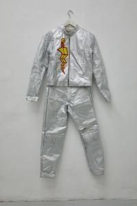 Return of the Lepidopters (detail), 2019, 24 Graphic novels and comics, wood display board, flatscreen television with digital file, plastic and cotton fiber bead curtain in green, neon pink-lit room, chair, Dimensions variable
(undefined), Mark von Schlegell, Jan Kaps, Cologne