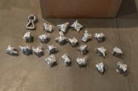 In Medias Res, 2019
26 aluminum Koenig spheres, 4 bronze Koenig spheres (on wall), 37 miniature aluminum bench ends, 1 miniature aluminum bench, 2 miniature long aluminum benches, bars of soap, 2 aluminum dog toys, 1 garden swan, 1 bronze swan, 1 plaster swan mold (near video), 11 pieces of glassware (inside two cartons) and silver leaf
Dimensions variable (Detail) (undefined), Nancy Lupo, Museum Of Contemporary Art San Diego