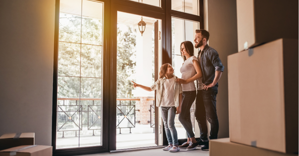 A family moving into a house