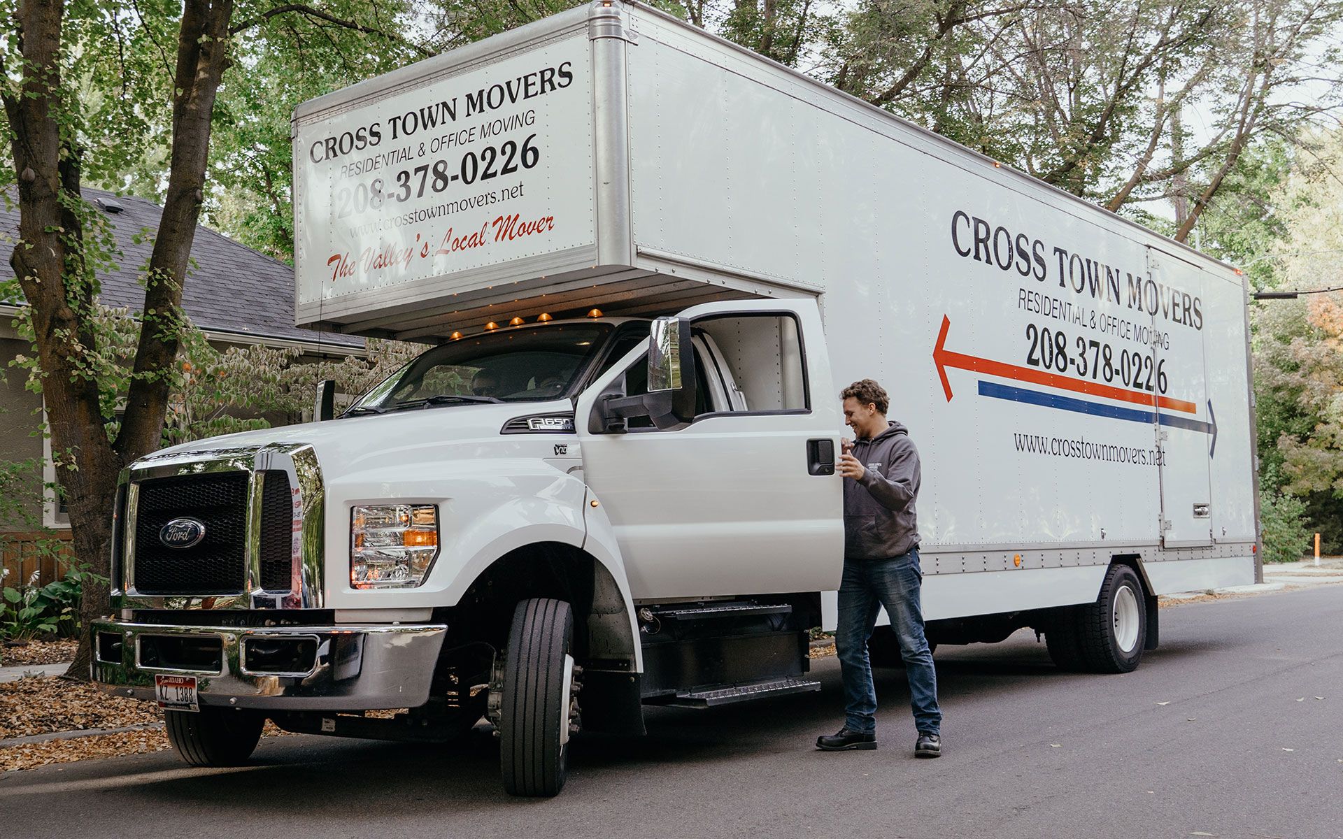 Cross Town Movers crew member getting into their truck | Cross Town Movers Boise, ID