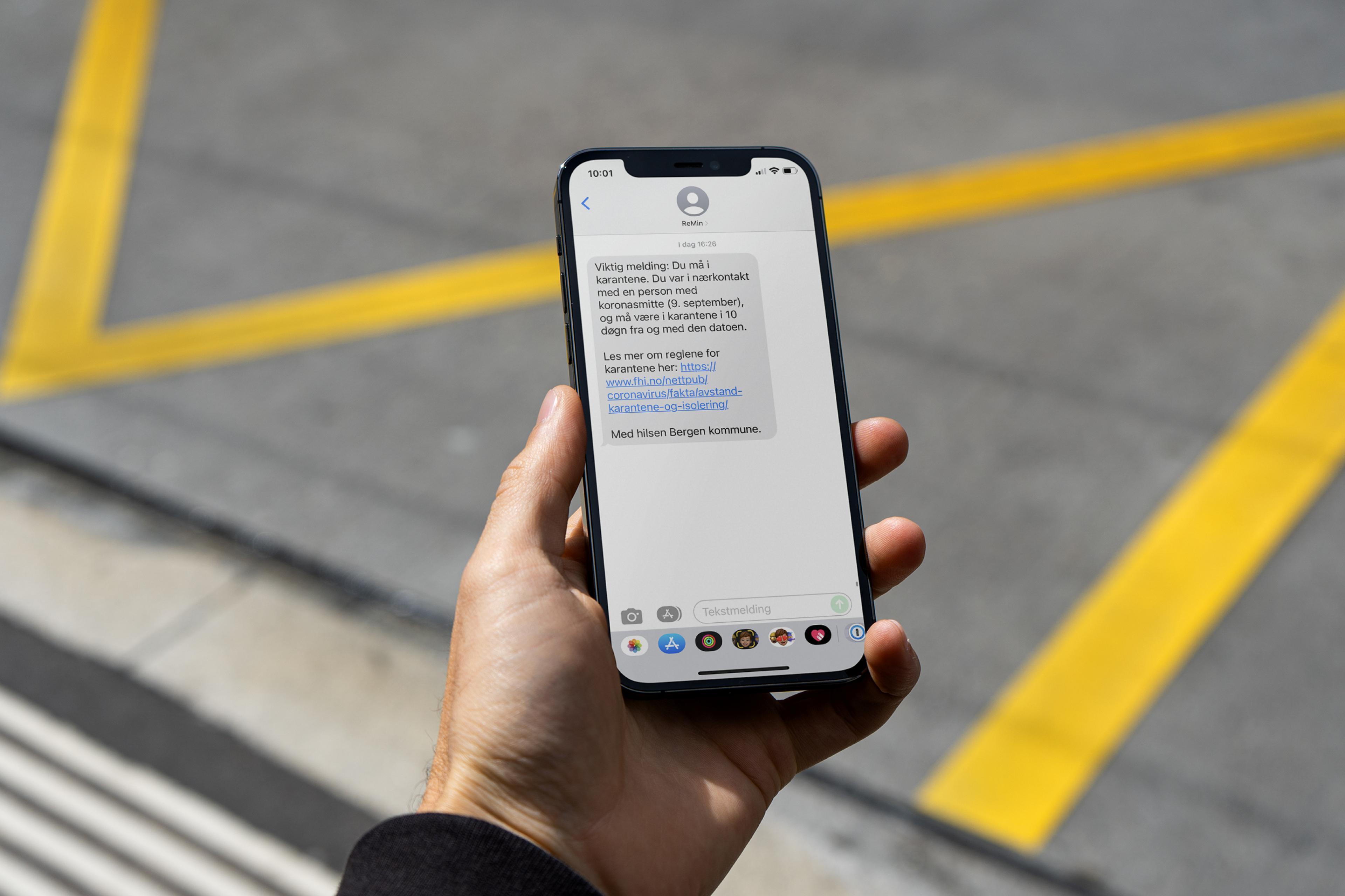 Mobil med SMS varsling om karantene