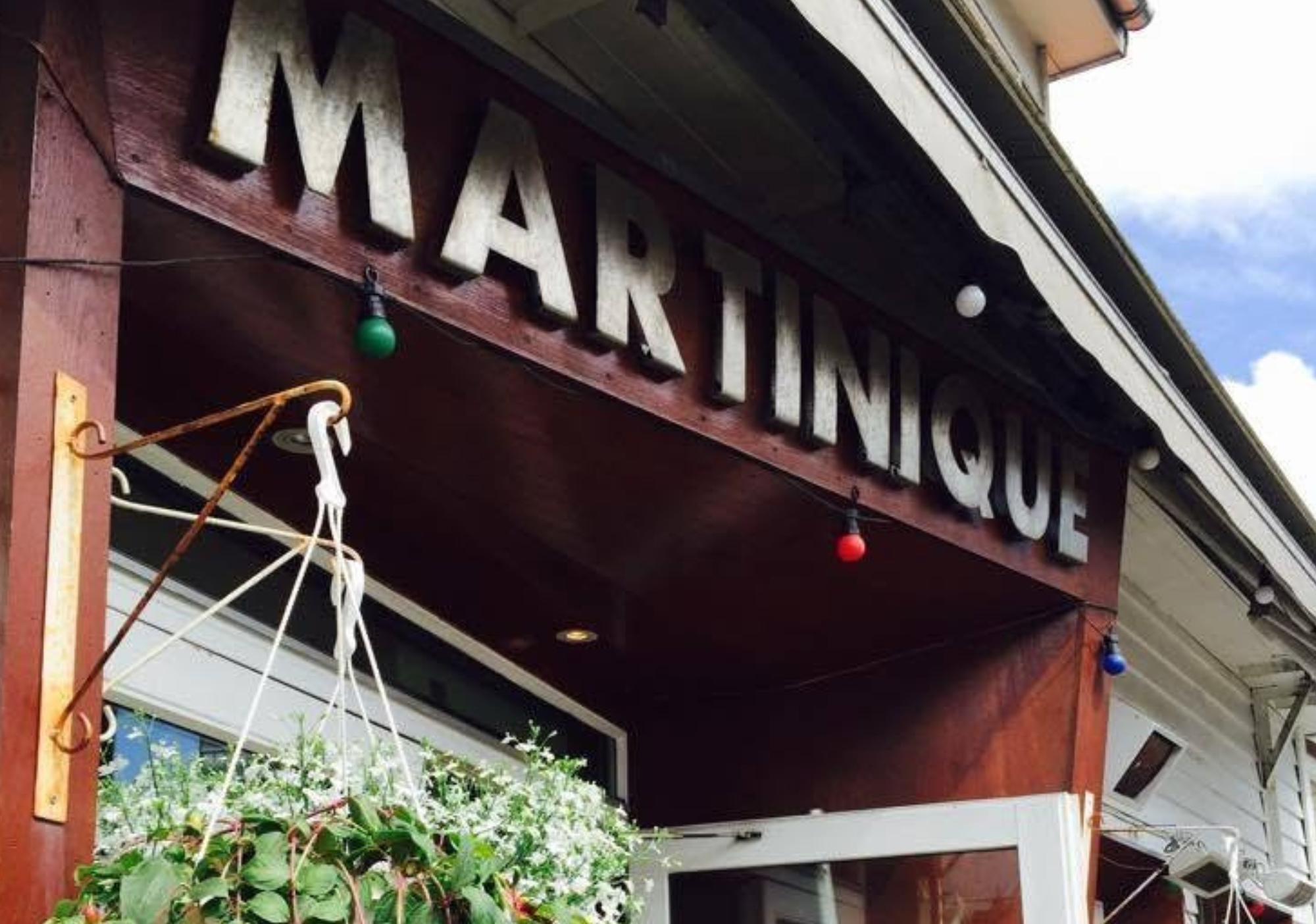 Foto av inngangen på utestedet Martinique