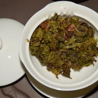 Premium Jasmine scented green tea ready for bulk sourcing, highlighting the high-quality, fully expanded infused tea foliage.