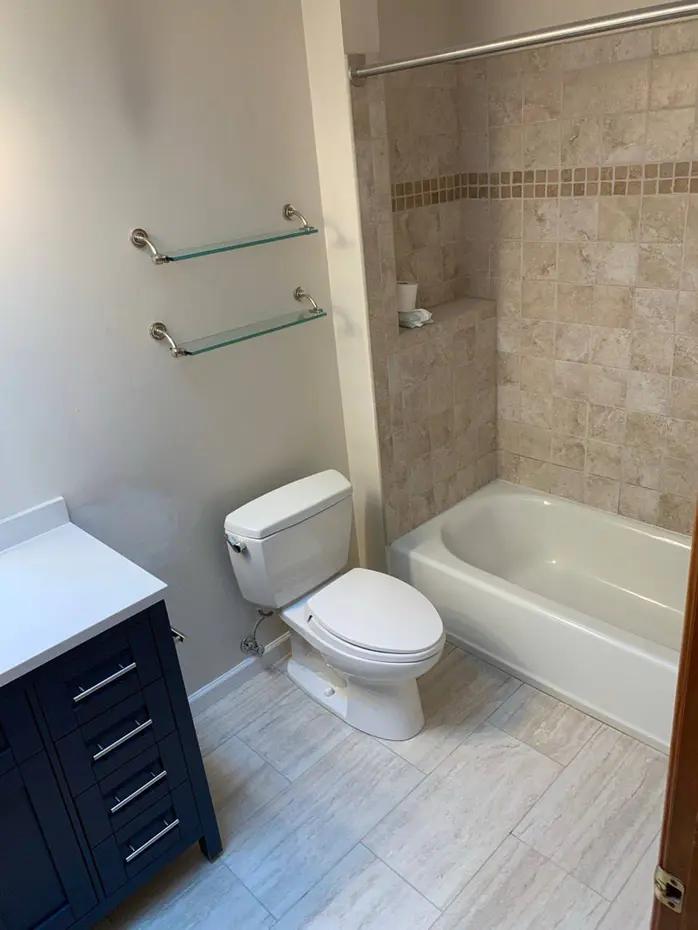 Walk-in shower with decorative tile and rain showerhead Bellevue