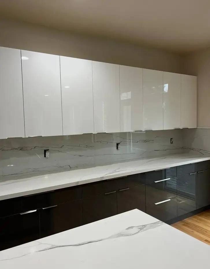 Modern flat panel kitchen cabinets with quartz countertop installation