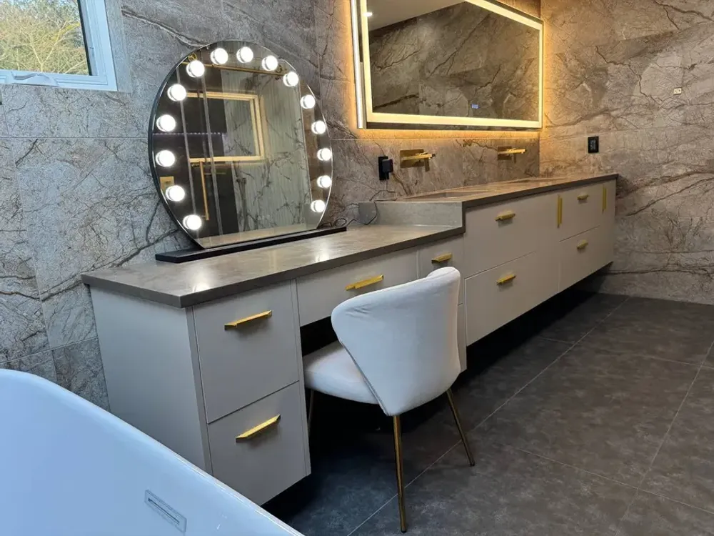 Vanity with a lighted mirror