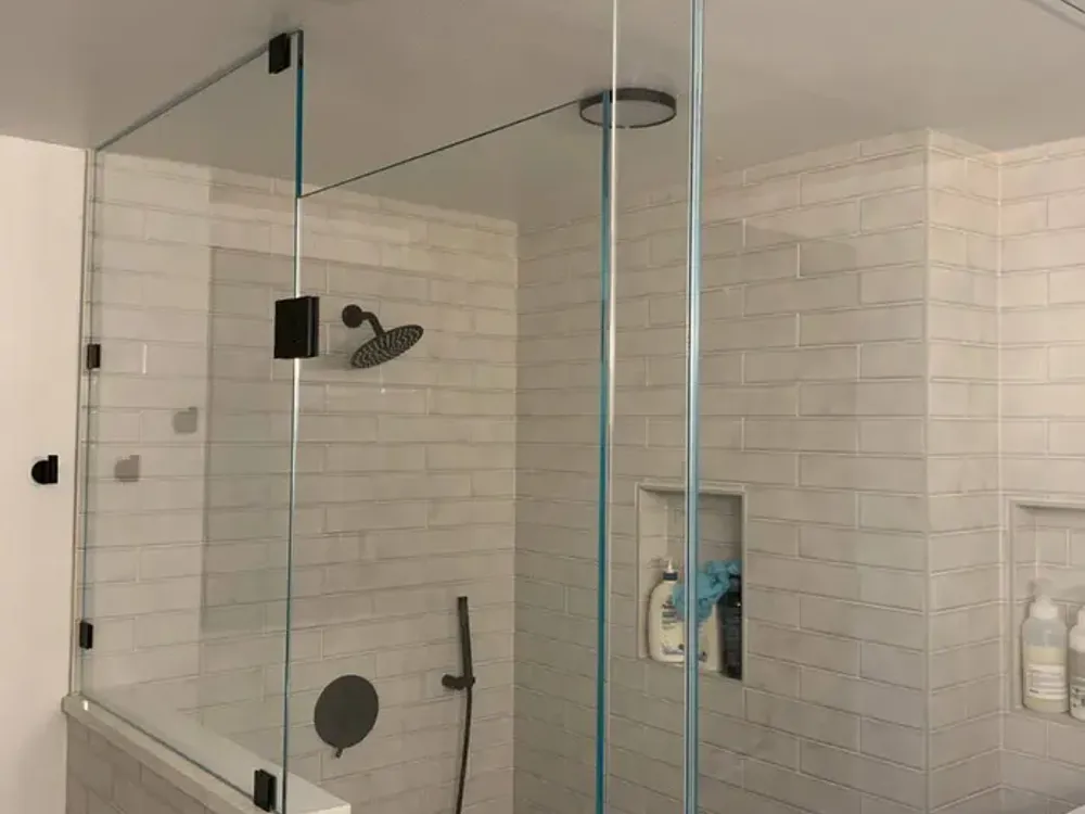 Glass shower enclosure