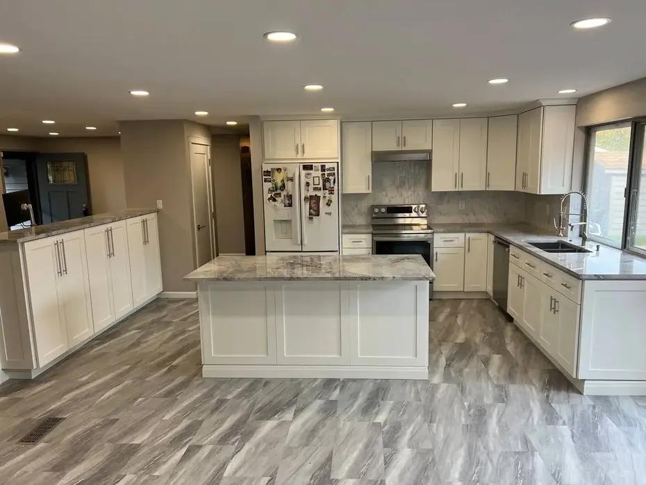 Marble-look quartz countertops with gray Shaker cabinets Seattle