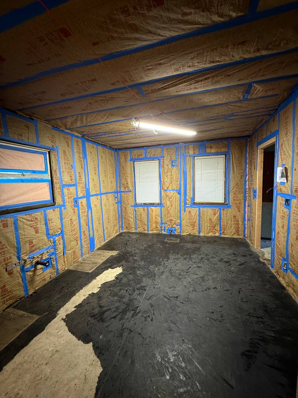 Room stripped to the studs during a renovation