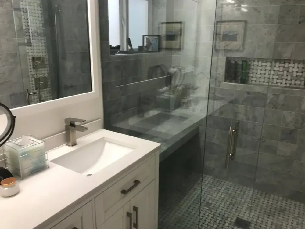 Floating vanity with a glass shower