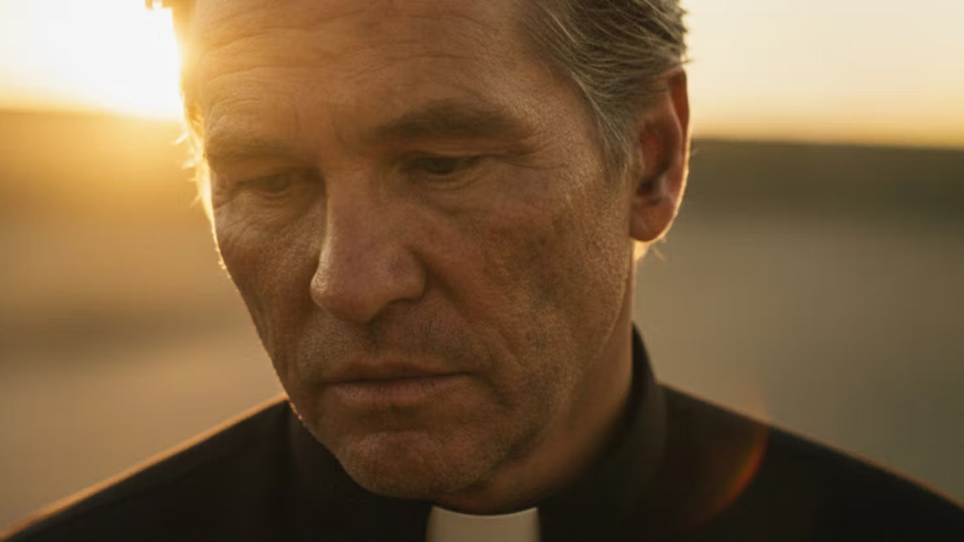 AI-genskabt version Val Kilmer som karakteren Father Fintan