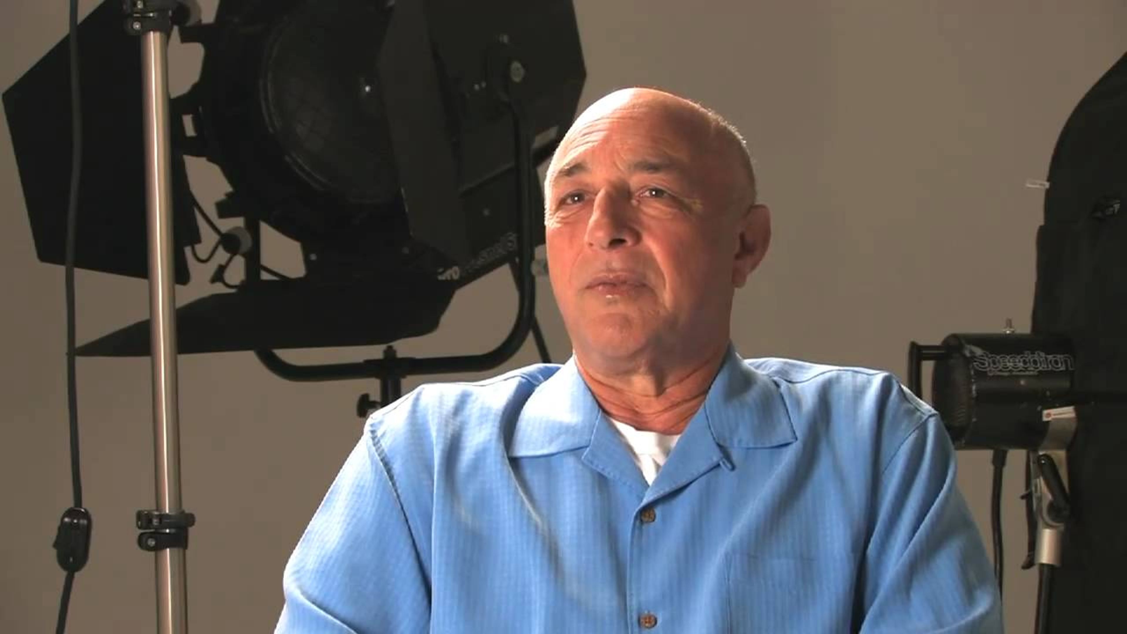 Man in camera studio