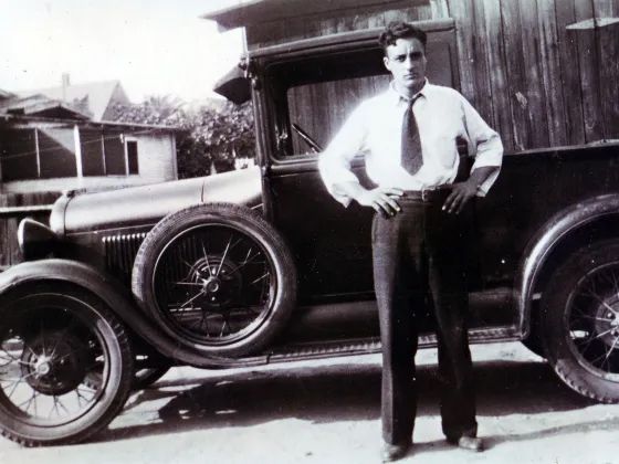 Man in front of car