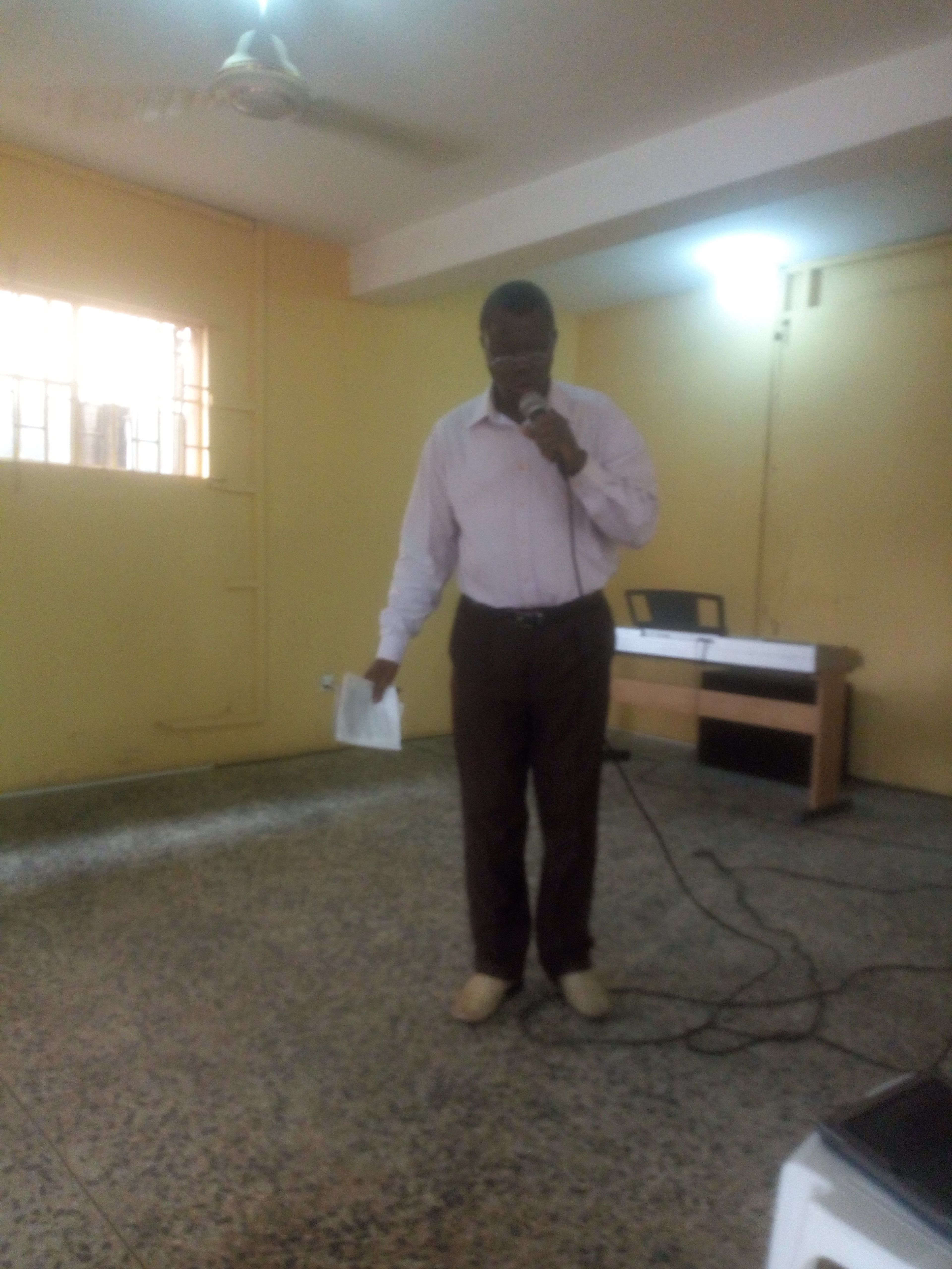 Pastor Z.A preaching to the first 3 members of the ministry
