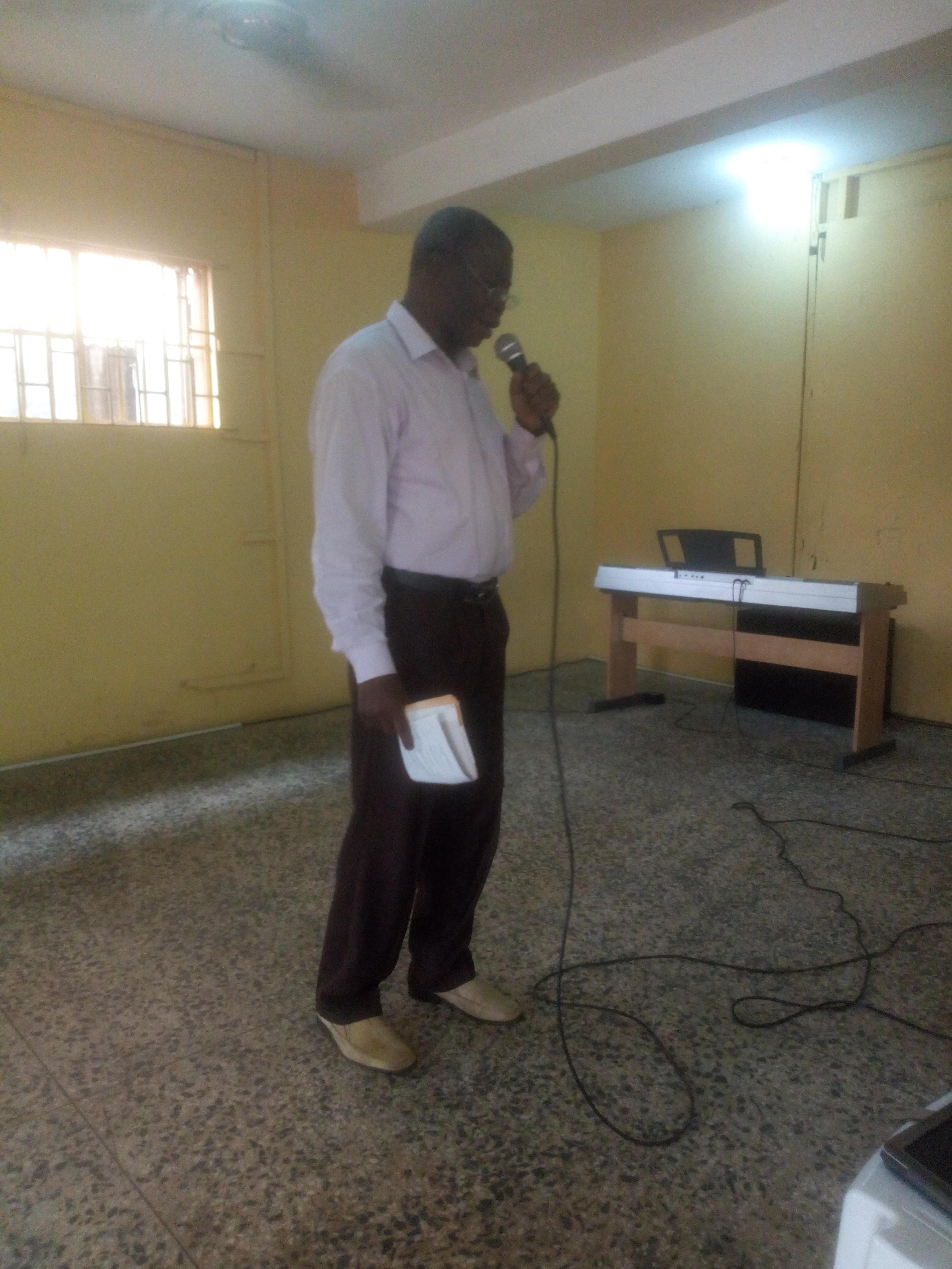 Pastor Z.A preaching to the first 3 members of the ministry