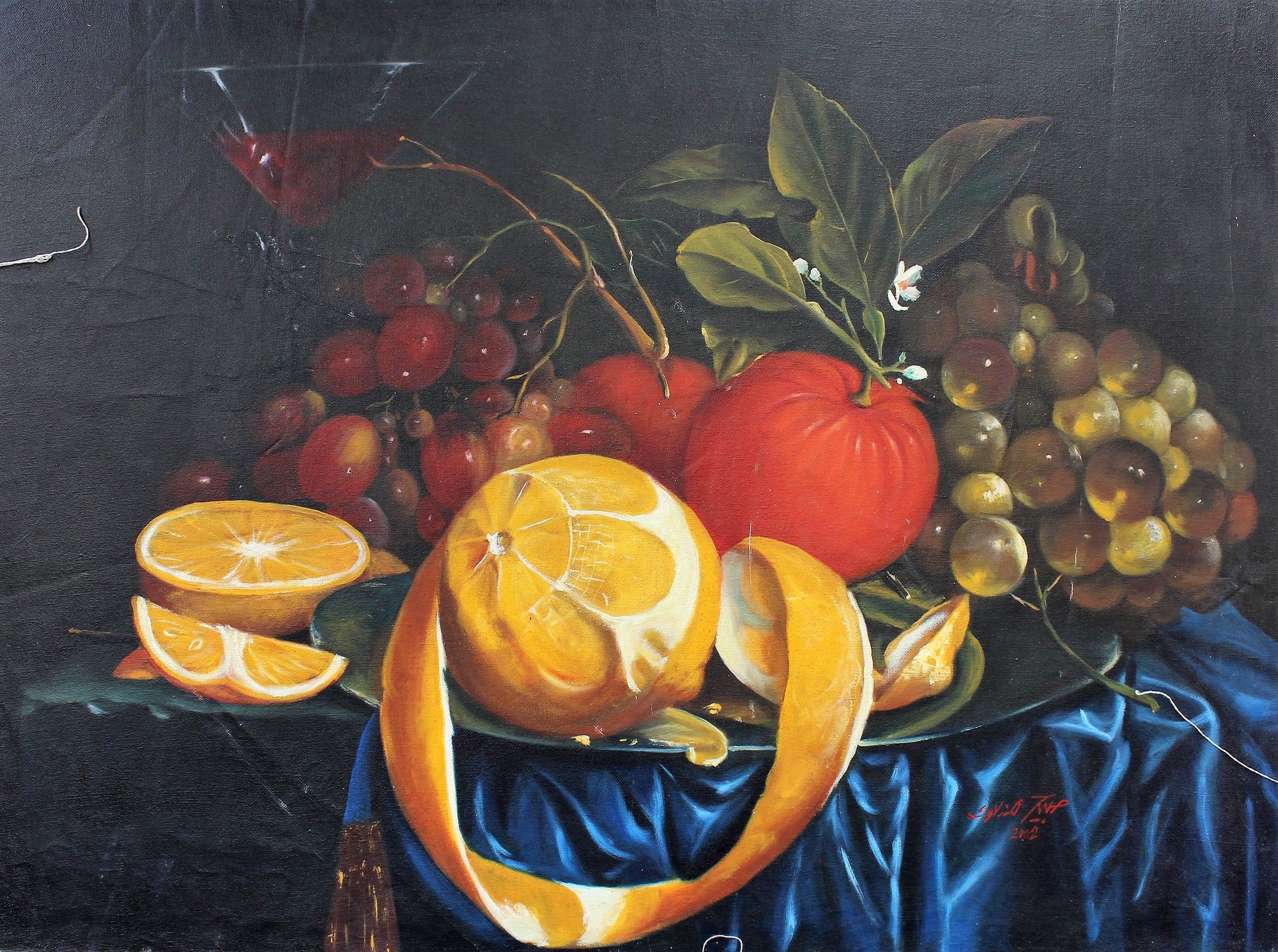 Nature morte d'oranges pelées, de raisins et de pommes