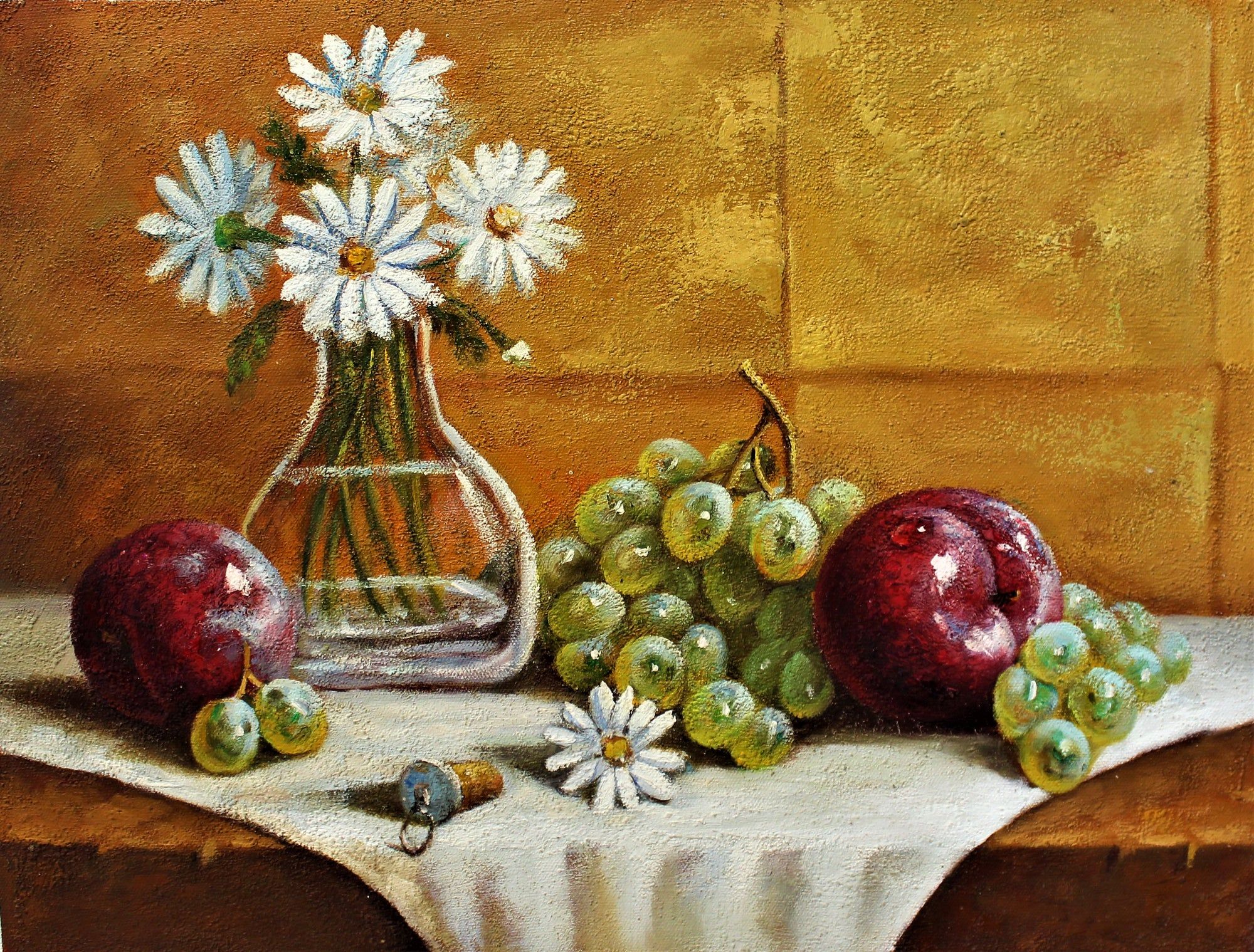 Nature morte de marguerites, de pommes et de raisins sur une table