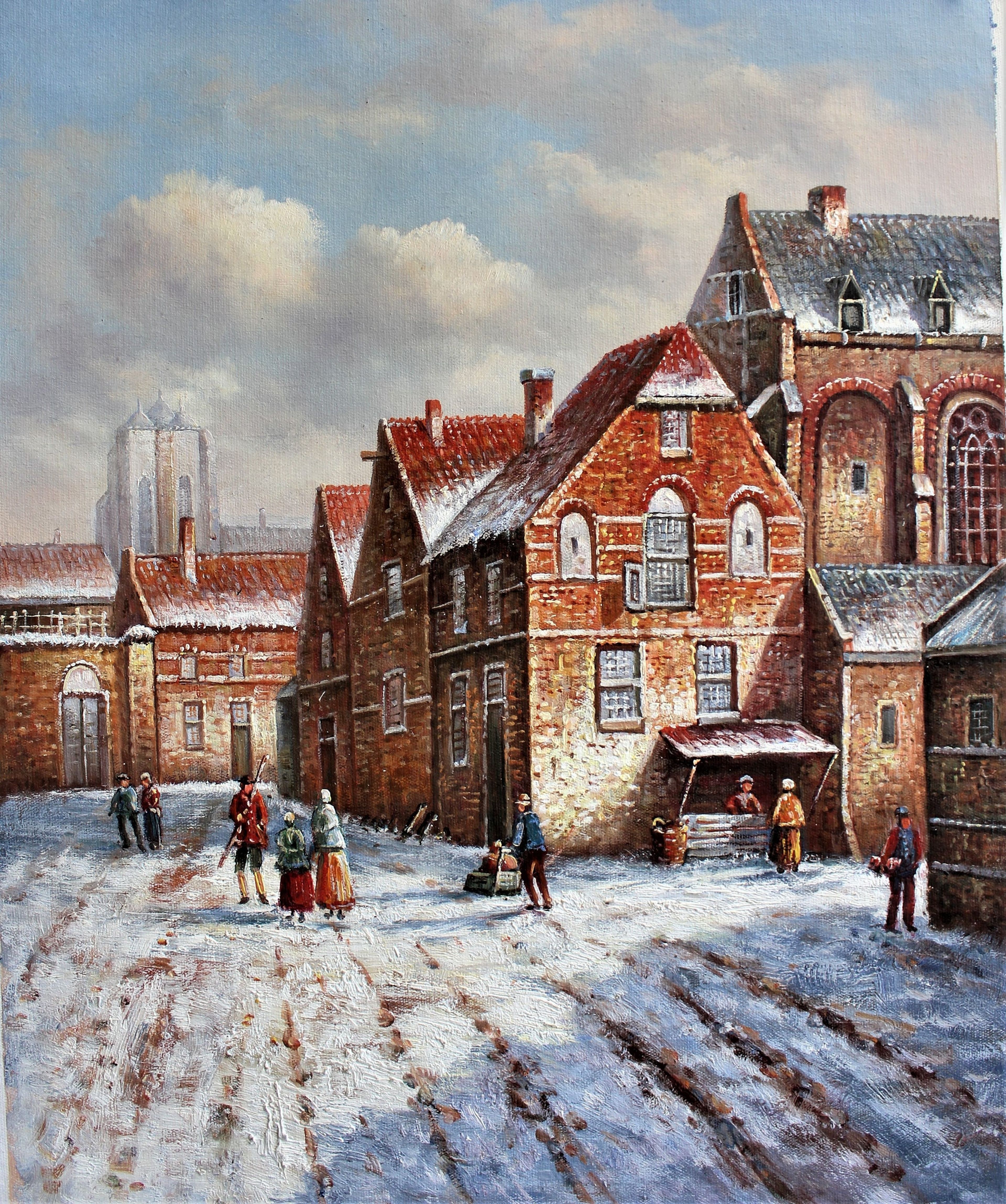 Rue enneigée avec des bâtiments en briques